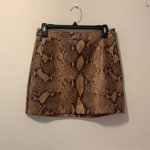 Snake print leather skirt
